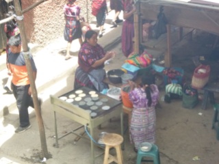 Preparing pupusa, Chichicastenango, Guatemala