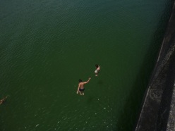 Guatape, jumping off the bridge, Colombia